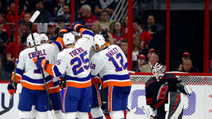 RALEIGH, NC – May 1: The New York Islanders celebrate a goal in Game Three of the Eastern Conference Second Round against the Carolina Hurricanes during the 2019 NHL Stanley Cup Playoffs at PNC Arena on May 1, 2019, in Raleigh, North Carolina. (Photo by Karl B DeBlaker/NHLI via Getty Images)