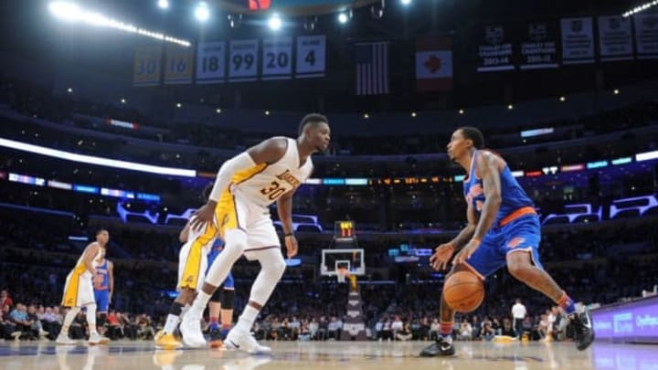 December 11, 2016; Los Angeles, CA, USA; New York Knicks guard Brandon Jennings (3) controls the ball against Los Angeles Lakers forward Julius Randle (30) during the first half at Staples Center. Mandatory Credit: Gary A. Vasquez-USA TODAY Sports