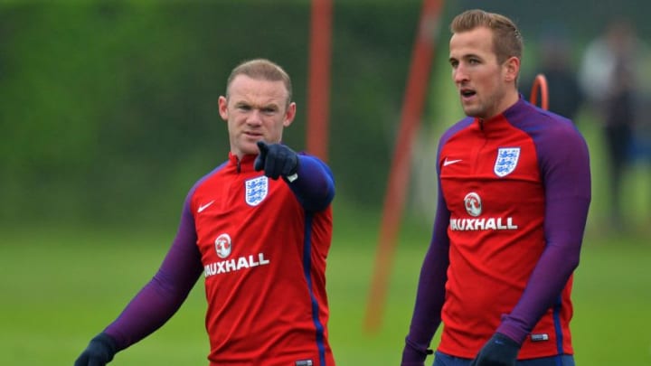 England's striker Wayne Rooney (L) gestures as talks with England's striker Harry Kane during a team training session in Watford, north of London, on June 1, 2016.England are set to play Portugal in an international friendly football match at Wembley on June 2, ahead of Euro 2016. / AFP / GLYN KIRK / NOT FOR MARKETING OR ADVERTISING USE / RESTRICTED TO EDITORIAL USE (Photo credit should read GLYN KIRK/AFP/Getty Images)