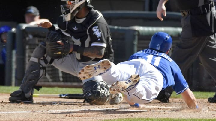 The Kansas City Royals' Bubba Starling, right, scores on a dropped fly ball hit by Drew Butera in the fourth inning against the Chicago White Sox during spring training on Saturday, March 3, 2018, in Surprise, Ariz. The White Sox won, 9-5. (John Sleezer/Kansas City Star/TNS via Getty Images)