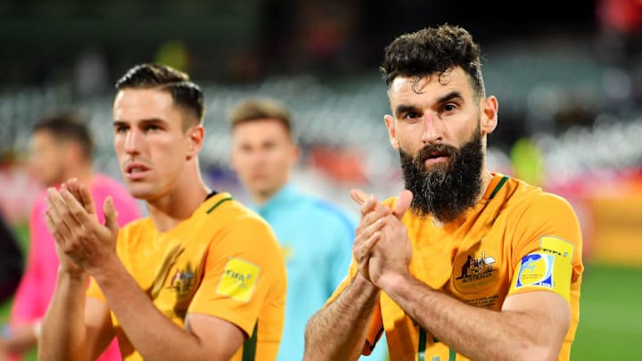 ADELAIDE, AUSTRALIA - JUNE 08: Milos Degenek and Mile Jedinak of Australia applaude the crowd after the 2018 FIFA World Cup Qualifier match between the Australian Socceroos and Saudi Arabia at the Adelaide Oval on June 8, 2017 in Adelaide, Australia. (Photo by Daniel Kalisz/Getty Images)