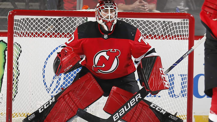 NEWARK, NJ - NOVEMBER 26: Louis Domingue #70 of the New Jersey Devils defends his net during the game against the Minnesota Wild at the Prudential Center on November 26, 2019 in Newark, New Jersey. (Photo by Andy Marlin/NHLI via Getty Images)"n"n"n