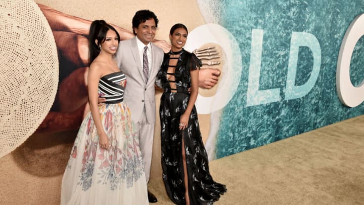 NEW YORK, NEW YORK - JULY 19: (L-R) Saleka Shyamalan, M. Night Shyamalan and Ishana Night Shyamalan attend the OLD World Premiere presented by Universal Pictures at Jazz at the Lincoln Center on July 19, 2021 in New York City. (Photo by Bryan Bedder/Getty Images for Universal)