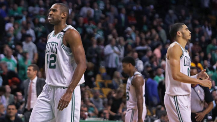 BOSTON, MA - MAY 27: As the final second tick off in the game, Boston Celtics Al Horford, Marcus Smart, and Jayson Tatum react, with head coach Brad Stevens in the background at left. The Boston Celtics hosted the Cleveland Cavaliers for Game Seven of their NBA Eastern Conference Finals playoff series at TD Garden in Boston on May 27, 2018. (Photo by Jim Davis/The Boston Globe via Getty Images)