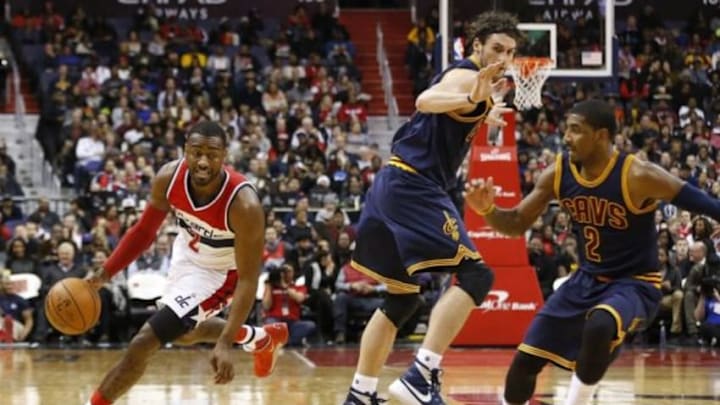 Jan 6, 2016; Washington, DC, USA; Washington Wizards guard John Wall (2) dribbles the ball as Cleveland Cavaliers guard Kyrie Irving (2) defends in the third quarter at Verizon Center. The Cavaliers won 121-115. Mandatory Credit: Geoff Burke-USA TODAY Sports
