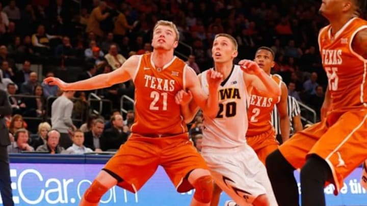 Nov 20, 2014; New York, NY, USA; Texas Longhorns forward Connor Lammert (21) and Iowa Hawkeyes forward Jarrod Uthoff (20) battle for position under the boards at Madison Square Garden. Texas Longhorns defeat the Iowa Hawkeyes 71-57. Mandatory Credit: Jim O Nov 20, 2014; New York, NY, USA; Texas Longhorns forward Connor Lammert (21) and Iowa Hawkeyes forward Jarrod Uthoff (20) battle for position under the boards at Madison Square Garden. Texas Longhorns defeat the Iowa Hawkeyes 71-57. Mandatory Credit: Jim O