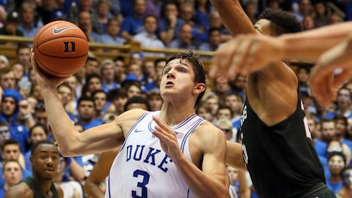 Nov 29, 2016; Durham, NC, USA; Duke Blue Devils guard Grayson Allen (3) drives past Michigan State Spartans forward Kenny Goins (25) in the second half of their game at Cameron Indoor Stadium. Mandatory Credit: Mark Dolejs-USA TODAY Sports