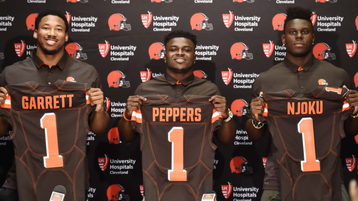 Apr 28, 2017; Berea, OH, USA; Cleveland Browns first round picks defensive lineman Myles Garrett and defensive back Jabrill Peppers and tight end David Njoku display their jerseys to the media at the Cleveland Browns training facility. Mandatory Credit: Ken Blaze-USA TODAY Sports