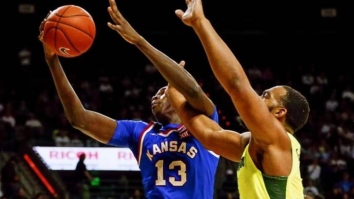 Feb 23, 2016; Waco, TX, USA; Kansas Jayhawks forward Cheick Diallo (13) shoots as Baylor Bears forward Rico Gathers (2) defends during the first half at Ferrell Center. Mandatory Credit: Kevin Jairaj-USA TODAY Sports Feb 23, 2016; Waco, TX, USA; Kansas Jayhawks forward Cheick Diallo (13) shoots as Baylor Bears forward Rico Gathers (2) defends during the first half at Ferrell Center. Mandatory Credit: Kevin Jairaj-USA TODAY Sports
