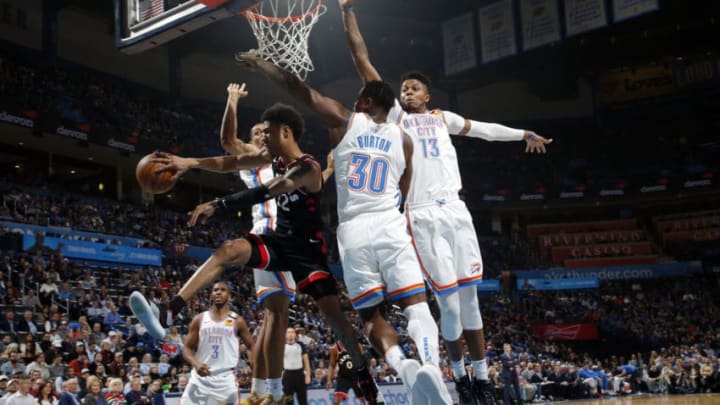 OKLAHOMA CITY, OK - JANUARY 15: Patrick McCaw #22 of the Toronto Raptors passes the ball during the game against the Oklahoma City Thunder on January 15, 2020 at Chesapeake Energy Arena in Oklahoma City, Oklahoma. NOTE TO USER: User expressly acknowledges and agrees that, by downloading and or using this photograph, User is consenting to the terms and conditions of the Getty Images License Agreement. Mandatory Copyright Notice: Copyright 2020 NBAE (Photo by Jeff Haynes/NBAE via Getty Images)
