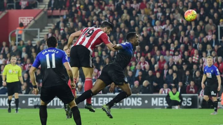 SOUTHAMPTON, ENGLAND – NOVEMBER 01: Graziano Pelle of Southampton outjumps Sylvain Distin of Bournemouth to score their second goal during the Barclays Premier League match between Southampton and A.F.C. Bournemouth at St Mary’s Stadium on November 1, 2015 in Southampton, England. (Photo by Alex Broadway/Getty Images)