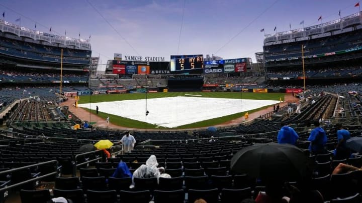 Sep 2, 2013; Bronx, NY, USA; General view of the tarp covered field during a rain delay between the Chicago White Sox and the New York Yankees at Yankee Stadium. Mandatory Credit: Anthony Gruppuso-USA TODAY Sports