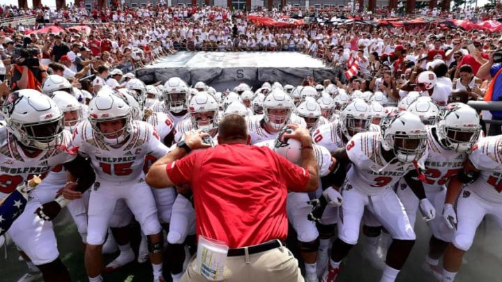 RALEIGH, NC - SEPTEMBER 08: Head coach Dave Doeren and the North Carolina State Wolfpack take the field for their game against the Georgia State Panthers at Carter-Finley Stadium on September 8, 2018 in Raleigh, North Carolina. (Photo by Grant Halverson/Getty Images)