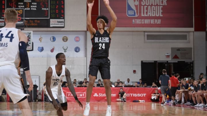 LAS VEGAS, NV - JULY 7: Anfernee Simons #24 of the Utah Jazz shoots the ball against the Portland Trail Blazers during the 2018 Las Vegas Summer League on July 7, 2018 at the Cox Pavilion in Las Vegas, Nevada. NOTE TO USER: User expressly acknowledges and agrees that, by downloading and/or using this Photograph, user is consenting to the terms and conditions of the Getty Images License Agreement. Mandatory Copyright Notice: Copyright 2018 NBAE (Photo by David Dow/NBAE via Getty Images)