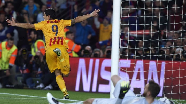 BARCELONA, SPAIN - APRIL 05: Luis Suarez of Barcelona celebrates scoring his team's second goal during the UEFA Champions League Quarter Final first leg match between FC Barcelona and Atletico de Madrid at Camp Nou on April 5, 2016 in Barcelona, Spain. (Photo by Manuel Queimadelos Alonso/Getty Images)