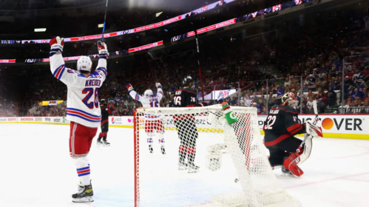 RALEIGH, NORTH CAROLINA - MAY 26: The New York Rangers celebrate a goal against the Carolina Hurricanes in Game Five of the Second Round of the 2022 Stanley Cup Playoffs at PNC Arena on May 26, 2022 in Raleigh, North Carolina. (Photo by Bruce Bennett/Getty Images)