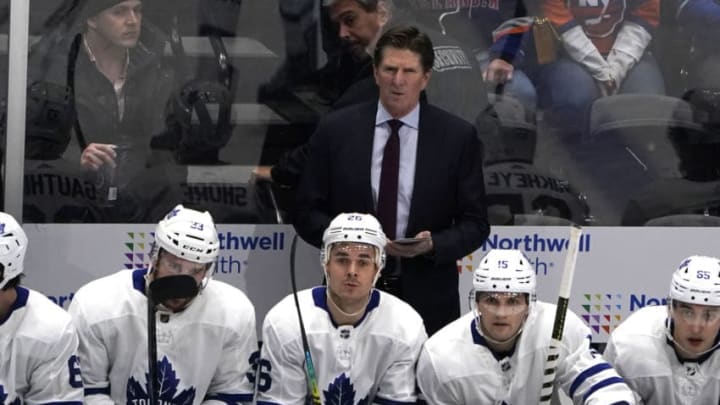 UNIONDALE, NY - NOVEMBER 13: Toronto Maple Leafs Head Coach Mike Babcock looks on from the bench during the first period of the National Hockey League game between the Toronto Maple Leafs and the New York Islanders on November 13, 2019, at the Nassau Veterans Memorial Coliseum in Uniondale, NY. (Photo by Gregory Fisher/Icon Sportswire via Getty Images)