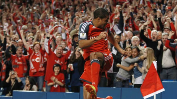 Toronto FC forward Ryan Johnson (9) celebrates scoring the first goal of the game in first half action as Toronto FC play Los Angeles Galaxy in the first leg of their CONCACAF Champions league quarter-final at Rogers Centre in Toronto. March 7, 2012. STEVE RUSSELL/TORONTO STAR (Photo by Steve Russell/Toronto Star via Getty Images)