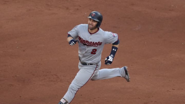 TORONTO, ON - JULY 25: Brian Dozier #2 of the Minnesota Twins runs to second base as he hits a double in the eleventh inning during MLB game action against the Toronto Blue Jays at Rogers Centre on July 25, 2018 in Toronto, Canada. (Photo by Tom Szczerbowski/Getty Images)