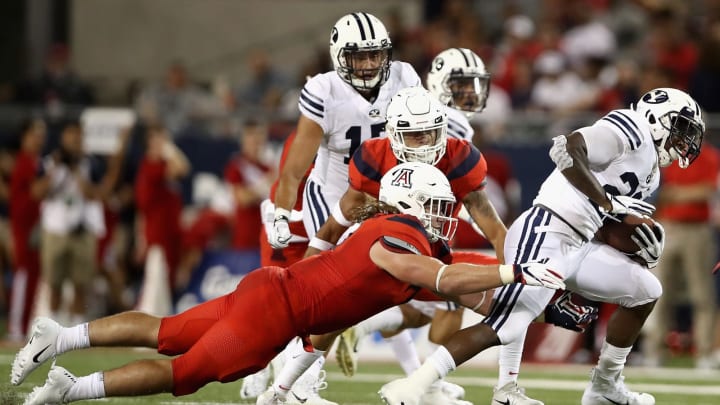 TUCSON, AZ – SEPTEMBER 01: Running back Squally Canada #22 of the Brigham Young Cougars rushes the football against the Arizona Wildcats during the college football game at Arizona Stadium on September 1, 2018 in Tucson, Arizona. The Cougars defeated the Wildcats 28-23. (Photo by Christian Petersen/Getty Images)