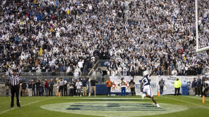 STATE COLLEGE, PA - OCTOBER 23: KeAndre Lambert-Smith #13 of the Penn State Nittany Lions scores a touchdown against the Illinois Fighting Illini during the first half at Beaver Stadium on October 23, 2021 in State College, Pennsylvania. (Photo by Scott Taetsch/Getty Images)