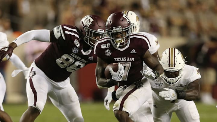 COLLEGE STATION, TEXAS - AUGUST 29: Jashaun Corbin #7 of the Texas A&M Aggies rushes with the ball past Kumonde Hines #7 of the Texas State Bobcats in the first half at Kyle Field on August 29, 2019 in College Station, Texas. (Photo by Bob Levey/Getty Images) COLLEGE STATION, TEXAS - AUGUST 29: Jashaun Corbin #7 of the Texas A&M Aggies rushes with the ball past Kumonde Hines #7 of the Texas State Bobcats in the first half at Kyle Field on August 29, 2019 in College Station, Texas. (Photo by Bob Levey/Getty Images)