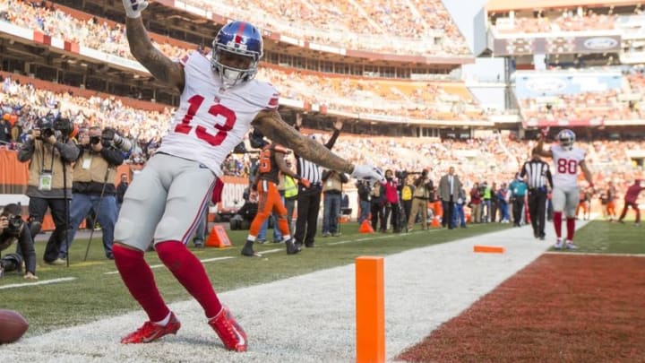 Nov 27, 2016; Cleveland, OH, USA; New York Giants wide receiver Odell Beckham (13) celebrates his touchdown run against the Cleveland Browns during the second quarter at FirstEnergy Stadium. Mandatory Credit: Scott R. Galvin-USA TODAY Sports