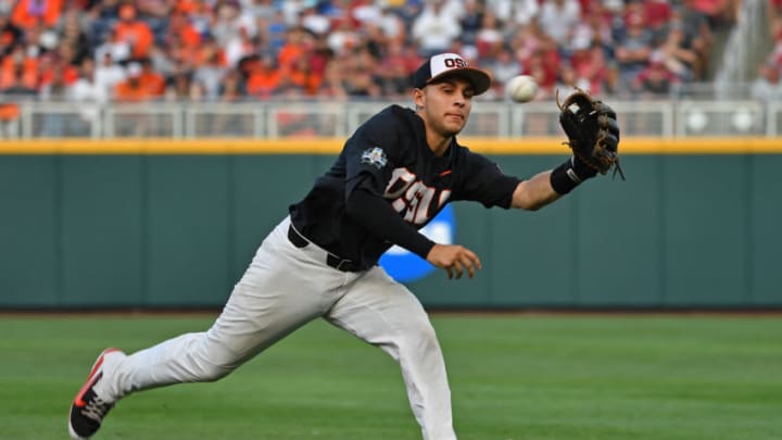 Omaha, NE - JUNE 26: Infielder Nick Madrigal #3 of the Oregon State Beavers chases after a chopper through the infield in the fifth inning against the Arkansas Razorbacks during game one of the College World Series Championship Series on June 26, 2018 at TD Ameritrade Park in Omaha, Nebraska. (Photo by Peter Aiken/Getty Images)