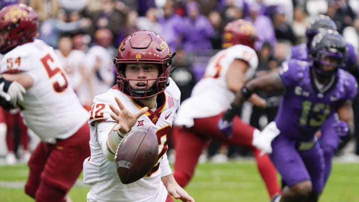Nov 26, 2022; Fort Worth, Texas, USA; Iowa State Cyclones quarterback Hunter Dekkers (12) pitches the ball against the TCU Horned Frogs during the first half at Amon G. Carter Stadium. Mandatory Credit: Raymond Carlin III-USA TODAY Sports