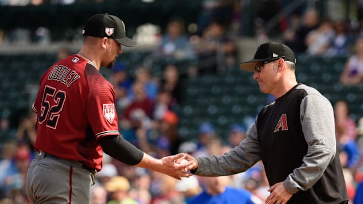 MESA, ARIZONA - FEBRUARY 26: Zack Godley #52 of the Arizona Diamondbacks is relieved by manager Torey Lovullo #17 in the first inning of the spring training game against the Chicago Cubs at Sloan Park on February 26, 2019 in Mesa, Arizona. (Photo by Jennifer Stewart/Getty Images)