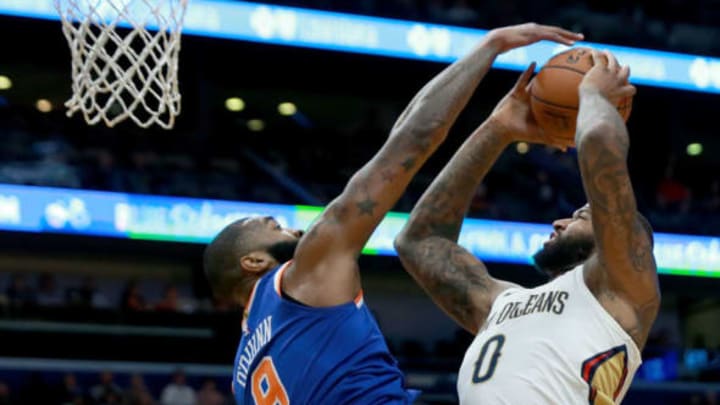 NEW ORLEANS, LA – DECEMBER 30: Kyle O’Quinn #9 of the New York Knicks blocks DeMarcus Cousins #0 of the New Orleans Pelicans during the first half of a NBA game at the Smoothie King Center on December 30, 2017 in New Orleans, Louisiana. (Photo by Sean Gardner/Getty Images)