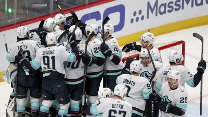 DENVER, COLORADO - APRIL 30: The Seattle Kraken celebrate their win against the Colorado Avalanche in Game Seven of the First Round of the 2023 Stanley Cup Playoffs at Ball Arena on April 30, 2023 in Denver, Colorado. (Photo by Matthew Stockman/Getty Images)