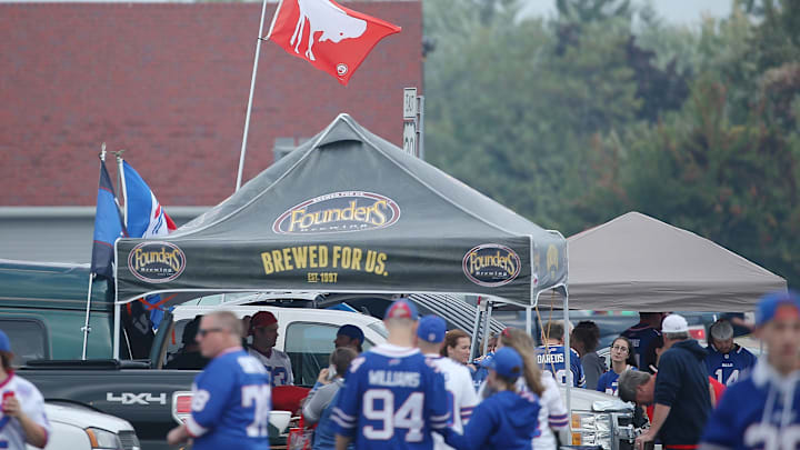 ORCHARD PARK, NY – SEPTEMBER 21: Buffalo Bills fans tailgate before the game against the San Diego Chargers at Ralph Wilson Stadium on September 21, 2014 in Orchard Park, New York. (Photo by Tom Szczerbowski/Getty Images)