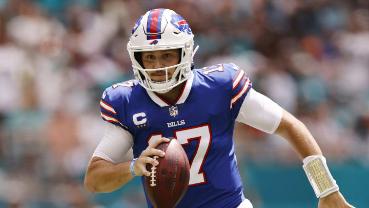 MIAMI GARDENS, FLORIDA – SEPTEMBER 19: Josh Allen #17 of the Buffalo Bills runs with the ball against the Miami Dolphins at Hard Rock Stadium on September 19, 2021 in Miami Gardens, Florida. (Photo by Michael Reaves/Getty Images)