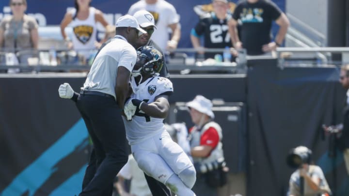 JACKSONVILLE, FLORIDA - SEPTEMBER 08: Myles Jack #44 of the Jacksonville Jaguars is led off the field after being ejected in the first half against the Kansas City Chiefs at TIAA Bank Field on September 08, 2019 in Jacksonville, Florida. (Photo by James Gilbert/Getty Images)