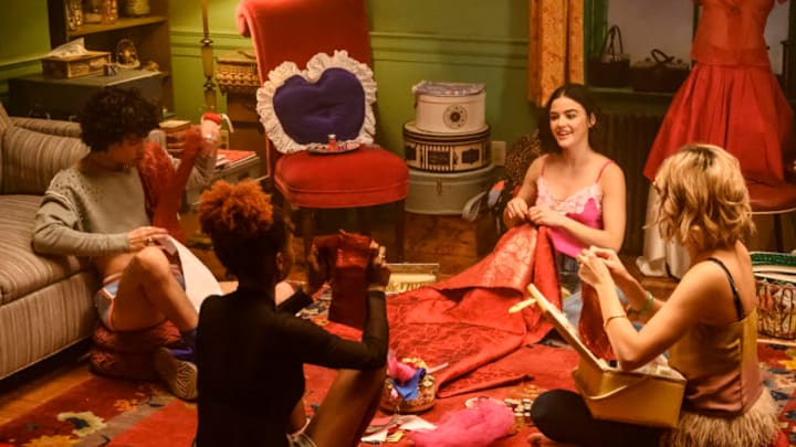 Katy Keene — “Chapter Five: Song for a Winter’s Night” — Image Number: KK105a_0096bc.jpg — Pictured (L-R): Jonny Beauchamp as Jorge Lopez, Ashleigh Murray as Josie McCoy, Lucy Hale as Katy Keene and Julia Chan as Pepper Smith — Photo: David Giesbrecht/The CW — © 2020 The CW Network, LLC. All Rights Reserved.