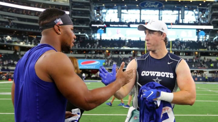 ARLINGTON, TEXAS - SEPTEMBER 08: Saquon Barkley #26 of the New York Giants and Sean Lee #50 of the Dallas Cowboys shakes hands after trading jerseys after the game at AT&T Stadium on September 08, 2019 in Arlington, Texas. (Photo by Richard Rodriguez/Getty Images)
