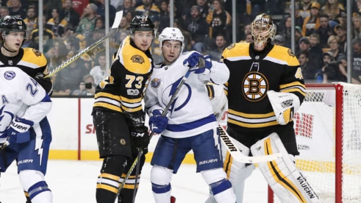 BOSTON, MA - NOVEMBER 29: Boston Bruins right defenseman Charlie McAvoy (73) tries to keep Tampa Bay Lightning center Tyler Johnson (9) busy in front of Boston Bruins goalie Tuukka Rask (40) during a game between the Boston Bruins and the Tampa Bay Lightning on November 29, 2017, at TD Garden in Boston, Massachusetts. The Bruins defeated the Lightning 3-2. (Photo by Fred Kfoury III/Icon Sportswire via Getty Images)