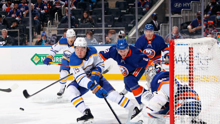 ELMONT, NEW YORK - DECEMBER 30: Semyon Varlamov #40 of the New York Islanders makes the third period save on John Hayden #15 of the Buffalo Sabres at the UBS Arena on December 30, 2021 in Elmont, New York. (Photo by Bruce Bennett/Getty Images)