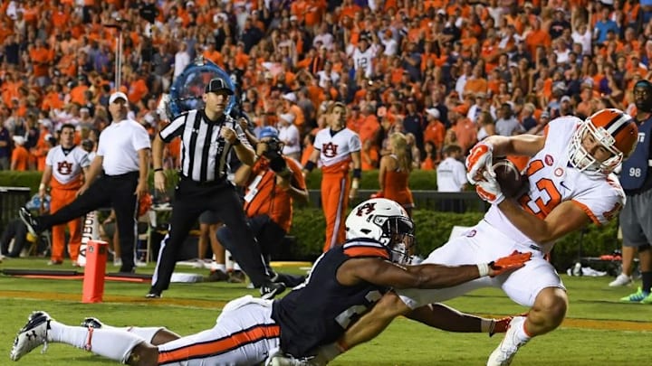 Sep 3, 2016; Auburn, AL, USA; Clemson Tigers wide receiver Hunter Renfrow (13) scores a touchdown ahead of Auburn Tigers defensive back Johnathan Ford (23) during the fourth quarter at Jordan Hare Stadium. Mandatory Credit: Shanna Lockwood-USA TODAY Sports Sep 3, 2016; Auburn, AL, USA; Clemson Tigers wide receiver Hunter Renfrow (13) scores a touchdown ahead of Auburn Tigers defensive back Johnathan Ford (23) during the fourth quarter at Jordan Hare Stadium. Mandatory Credit: Shanna Lockwood-USA TODAY Sports