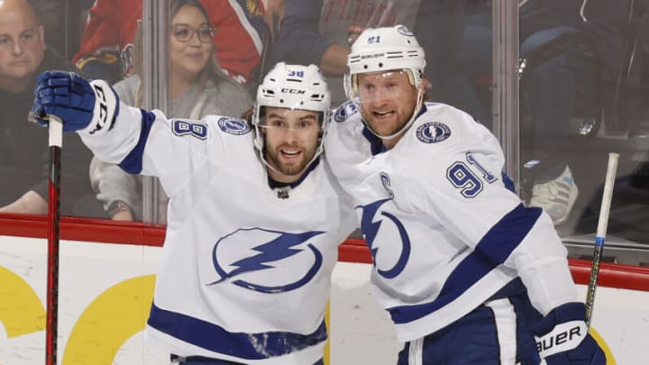 SUNRISE, FL - APRIL 24: Brandon Hagel #38 and Steven Stamkos #91 celebrate the first period goal by Cal Foote #52 of the Tampa Bay Lightning against the Florida Panthers at the FLA Live Arena on April 24, 2022 in Sunrise, Florida. (Photo by Joel Auerbach/Getty Images)