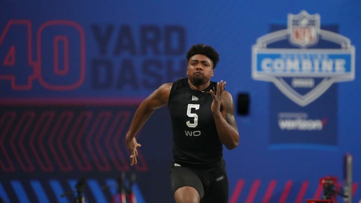 Mar 3, 2022; Indianapolis, IN, USA; Arkansas wide receiver Treylon Burks (WO05) runs the 40-yard dash during the 2022 NFL Scouting Combine at Lucas Oil Stadium. Mandatory Credit: Kirby Lee-USA TODAY Sports