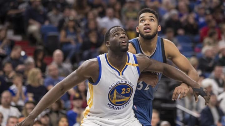 Dec 11, 2016; Minneapolis, MN, USA; Golden State Warriors forward Draymond Green (23) and Minnesota Timberwolves center Karl-Anthony Towns (32) wait for a rebound during a free throw in the second half at Target Center. The Warriors won 116-108. Mandatory Credit: Jesse Johnson-USA TODAY Sports