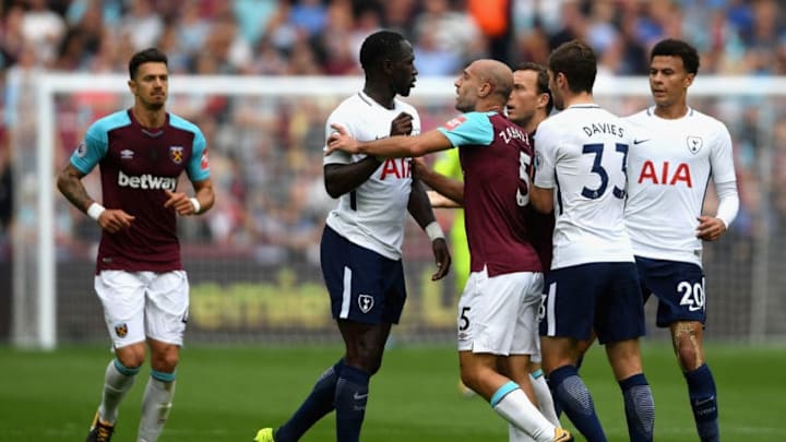 LONDON, ENGLAND - SEPTEMBER 23: Moussa Sissoko of Tottenham Hotspur and Pablo Zabaleta of West Ham United clash during the Premier League match between West Ham United and Tottenham Hotspur at London Stadium on September 23, 2017 in London, England. (Photo by Mike Hewitt/Getty Images)