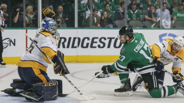 DALLAS, TX - APRIL 15: Nashville Predators goaltender Pekka Rinne (35) makes the save against Dallas Stars center Andrew Cogliano (17) during the game between the Dallas Stars and the Nashville Predators on April 15, 2019 at the American Airlines Center in Dallas, Texas. (Photo by Matthew Pearce/Icon Sportswire via Getty Images)