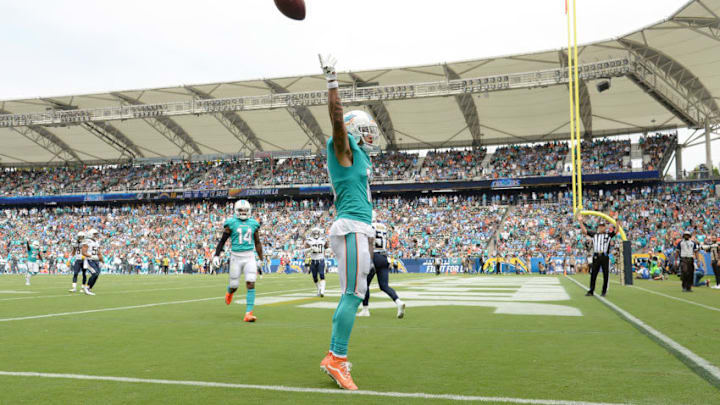 CARSON, CA - SEPTEMBER 17: Kenny Stills #10 of the Miami Dolphins celebrates after scoring a touchdown during the game against the Los Angeles Chargers at the StubHub Center on September 17, 2017 in Carson, California. (Photo by Kevork Djansezian/Getty Images)