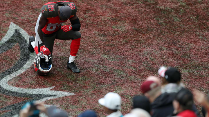 LONDON, ENGLAND – OCTOBER 13: Bobo Wilson of Tampa Bay Buccaneers takes a moment to pray in the end zone ahead of the NFL game between Carolina Panthers and Tampa Bay Buccaneers at Tottenham Hotspur Stadium on October 13, 2019 in London, England. (Photo by Naomi Baker/Getty Images)