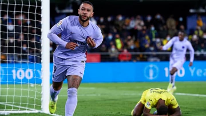 Memphis Depay celebrates after scoring during a La Liga match between Villarreal CF and FC Barcelona at Estadio de la Ceramica in November. (Photo by Aitor Alcalde Colomer/Getty Images)