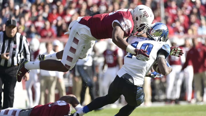 Nov 21, 2015; Philadelphia, PA, USA; Temple Owls defensive lineman Haason Reddick (58) dives to make a tackle on Memphis Tigers wide receiver Jae'lon Oglesby (19) during the first half at Lincoln Financial Field. Mandatory Credit: Derik Hamilton-USA TODAY Sports