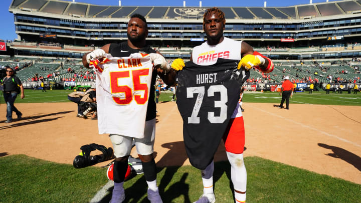 OAKLAND, CALIFORNIA – SEPTEMBER 15: Maurice Hurst #73 of the Oakland Raiders and Frank Clark #55 of the Kansas City Chiefs trade jerseys after the game at RingCentral Coliseum on September 15, 2019 in Oakland, California. (Photo by Daniel Shirey/Getty Images)